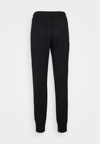 Schwarze Jogginghosen aus weichem Material mit einem elastischen Taillenbund und gerippten Bündchen, ausgestattet mit seitlichen Taschen für zusätzlichen Komfort.