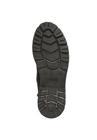 Semelle en caoutchouc noir avec un motif de grip texturé ; présente un logo et un marquage de taille. Matériau supérieur non visible. Forme alignée avec un design de chaussure.