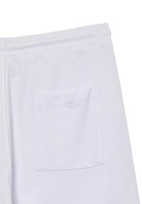 Pantaloni jogger bianchi realizzati in morbido tessuto misto cotone, con fascia elastica in vita e una singola tasca posteriore con bordo cucito.