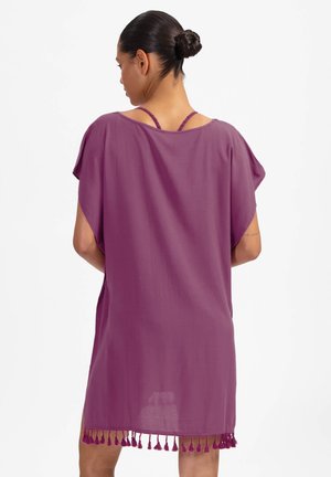 Paarse, lichtgewicht cover-up met brede mouwen. Voorzien van een zoom met kwastjes en verstelbare bandjes. Soepele textuur, mid-lengte model.