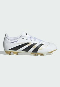 White soccer cleat with black and gold accents. Features a textured upper, three black stripes, and molded studs for traction.
