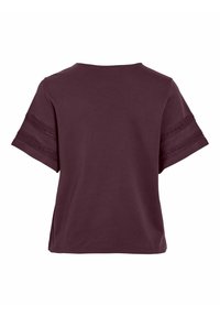 Short-sleeve, maroon top made of cotton. Features decorative lace stripes on sleeves and a crew neckline. Smooth texture, casual fit.