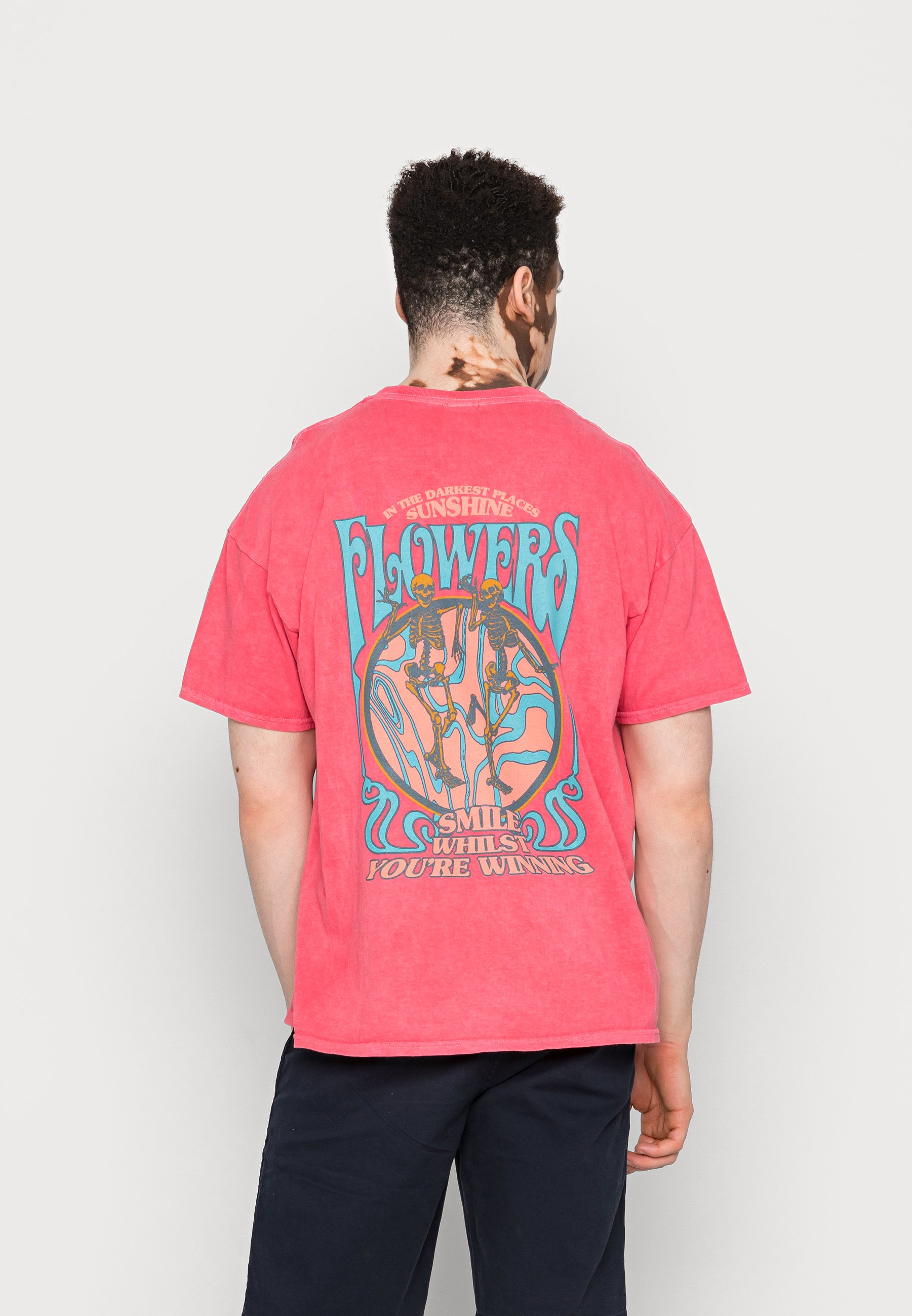 urban outfitters pink skeleton shirt