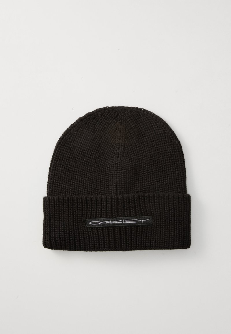 Black knitted beanie with a ribbed texture and a folded cuff, featuring a gray "Oakley" logo patch on the front.