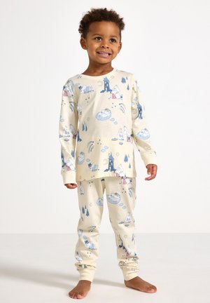 Cream-colored children's pajamas made of soft fabric, featuring blue illustrations of characters, clouds, and stars on the top and pants.