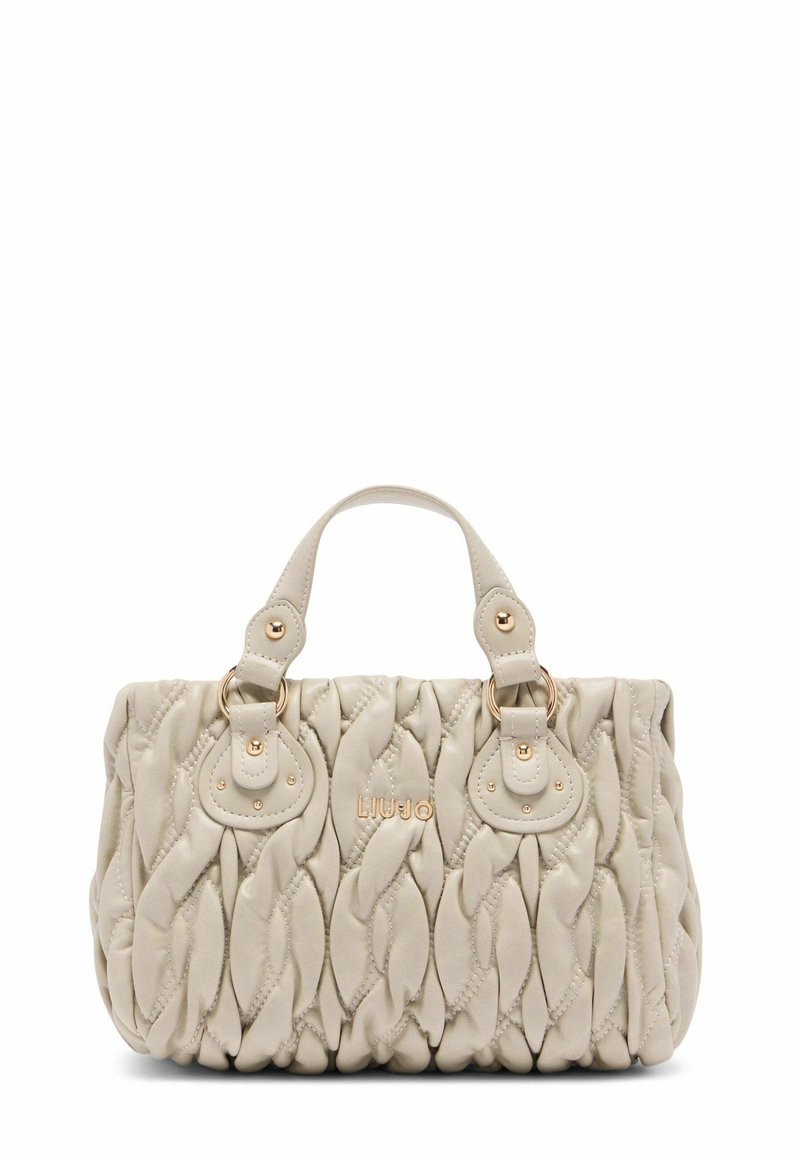 Borsa beige con design trapuntato, accentuata da hardware dorato, due manici superiori e dettaglio del logo sul davanti.