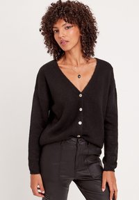 Cache Cache MIT V-AUSSCHNITT - Chaqueta de punto - noir