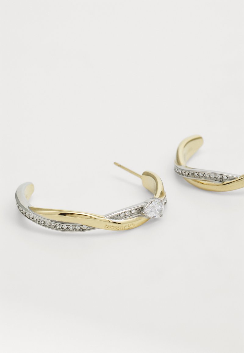 Guess Orecchini A Cerchio Intrecciati - Oro Rosa - Gioielli Moda Donna