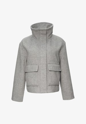 Gray wool blend jacket with a high collar, two front patch pockets, and a boxy shape. Soft texture and casual design.