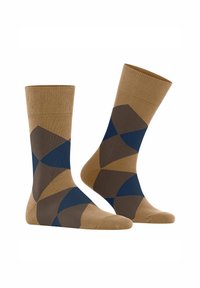 Calzini a righe marroni e beige con forme geometriche, con accenti blu navy, esposti in posizione verticale su uno sfondo bianco.