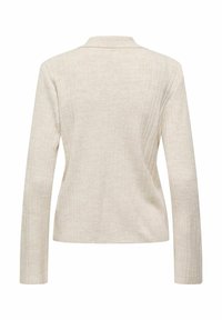 Beige gerippter Strickblazer mit Kragen, langen Ärmeln und taillierter Silhouette, aus einem strukturierten Stoff mit klaren Linien.