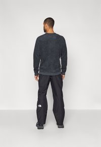 The North Face DAWNSTRIKE PANT - Snowboardové kalhoty - black