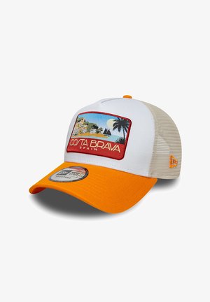White and beige mesh trucker cap with orange brim and "Costa Brava Spain" patch showing coastal scene with palm tree and sailboats.