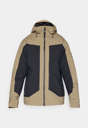 Izolēta jaka ar kapuci, kontrastējošām melnām un bēšām daļām, rāvējslēdzēja priekšpusi un regulējamām aprocēm. Ūdensizturīgs audums ar teksturētu apdari.