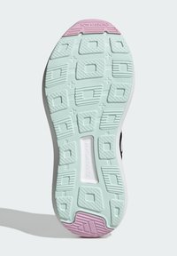 La suola della scarpa presenta un design testurizzato verde menta con pattern rettangolari e una sezione del tallone rosa etichettata "NON MARKING".