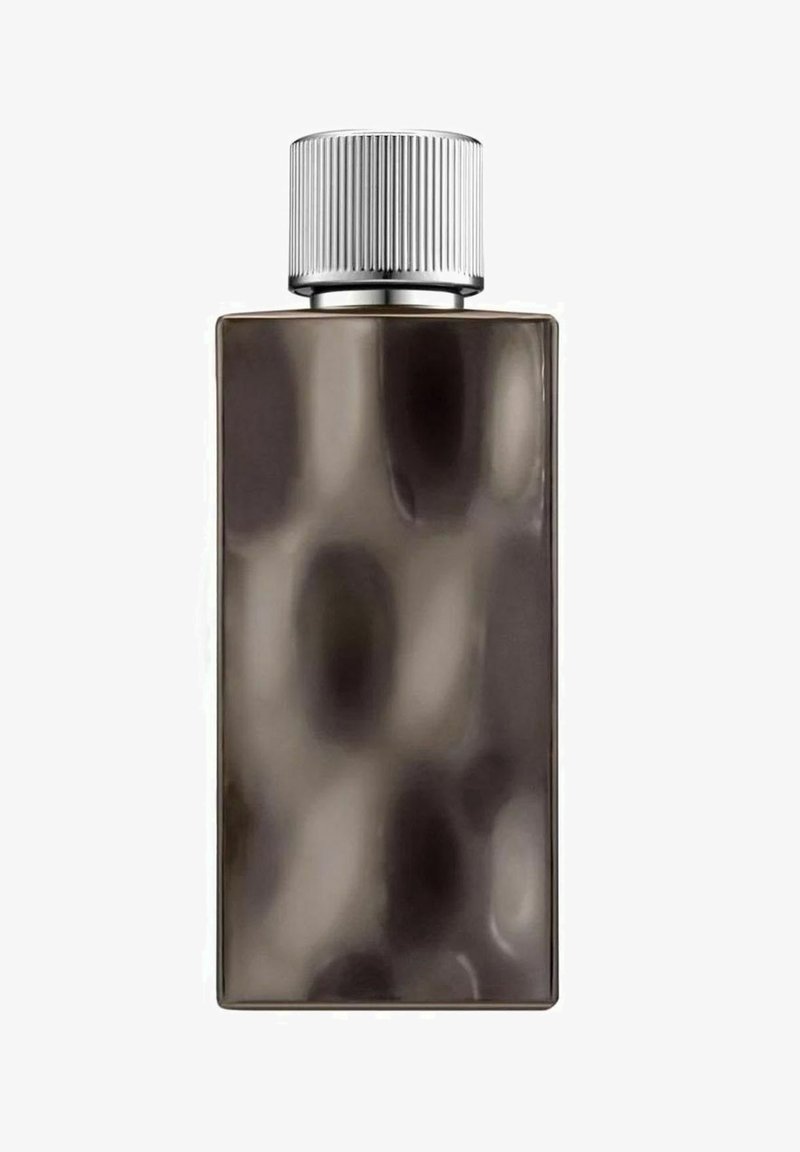 Brun glasflaske med en tekstureret overflade, rektangulær form og en sølv ribbet låg. Ingen etiketter eller mærker synlige.