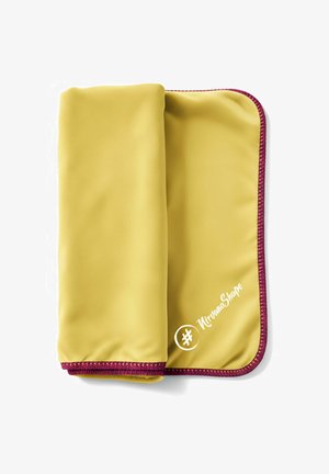 Yellow silicone mat with a smooth texture and maroon stitched edges, features a logo in white with a hashtag and circle design.
