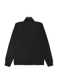 Zwarte ritsjack met lange mouwen, voorzien van een groen en rood gestreepte kraag. Smooth stof met een minimalistisch ontwerp, geen zichtbare logo's.