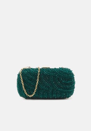 Kleine dunkelgrüne ovale Clutch-Tasche, bedeckt mit wirbelnden Perlenmustern und einem kurzen goldenen Kettenriemen.