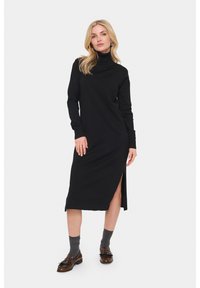 Černé dlouhé rukávy, rolákové šaty s bočním rozparkem. Vyrobené z žebernaté látky, středně dlouhý design, s přiléhavým střihem a detaily na manžetách.