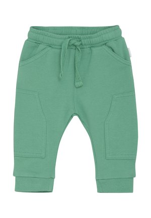 Groene peuter joggingbroek met elastische tailleband, koordje, voorzakken, zijzakken en geribbelde boorden.