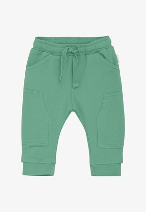 Grüne Kinder-Sweatpants mit elastischem Bund, Kordelzug, Fronttaschen, seitlichen Taschen und gerippten Säumen.