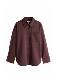 Maroon button-up shirt with a collar, long sleeves, and a single chest pocket. Made of smooth fabric with a relaxed fit and subtle sheen.