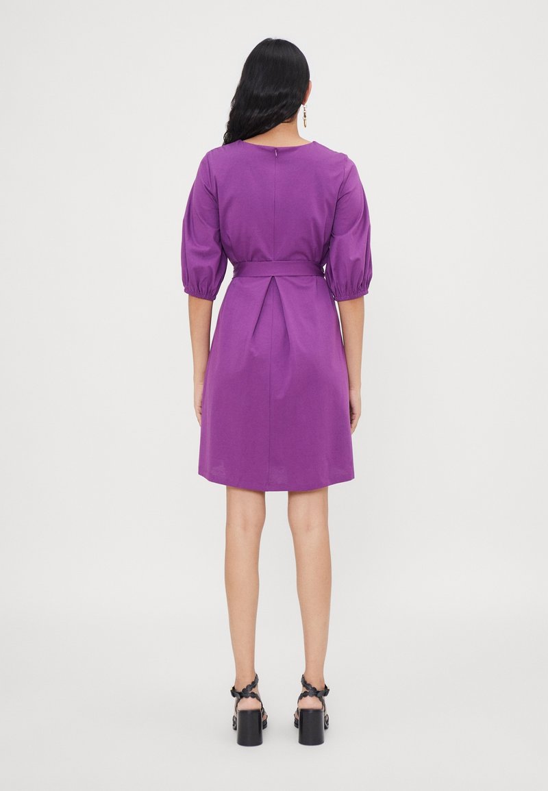 strapless open back dress Calvin Klein Bodycon Michelle Pfeiffer Inspired Cocktail Dress in Purp –  FADVault main image 0