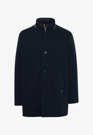 Marineblauer Mantel mit Stehkragen, vorderem Knopfverschluss, zwei Seitentaschen und dezentem Logoakzent am Saum. Weicher Stoff, taillierte Passform.