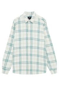 Chemise boutonnée en tissu doux avec un motif à carreaux bleu clair et beige. Manches longues avec un col classique et un ourlet droit.