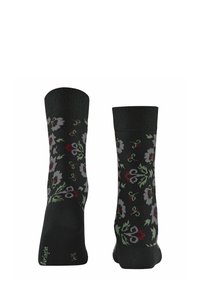 Czarne skarpetki z kwiatowym wzorem, z szarymi, czerwonymi i zielonymi kwiatami. Żebrowany brzeg na górze. Gładka tekstura, wysokość do kostki.
