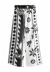 Pantalones de pierna ancha en tejido blanco y negro con estampados florales y de puntos, cinturilla elástica con cordón para un ajuste ajustable.