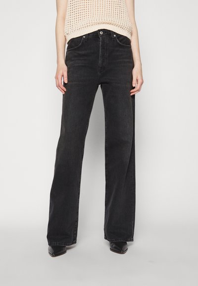 High-waisted black wide-leg jeans made from denim, featuring front pockets and stitched detailing along the seams.