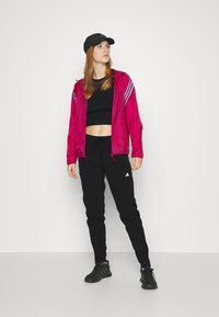 adidas Performance FAST PANT - Träningsbyxor - black