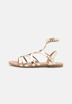 Sandalias - gold-coloured