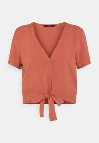 Rode blouse met korte mouwen, een V-hals, knopen aan de voorkant en een strik in de taille. Gemaakt van een gladde stof met een ontspannen pasvorm.