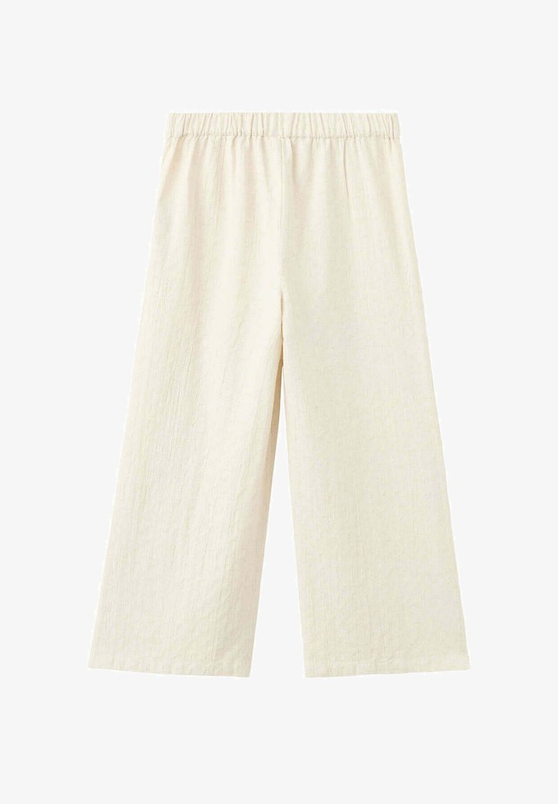 Pantalon ample crème à jambes larges avec taille élastique, confectionné dans un tissu léger et texturé.