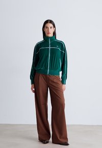 Lacoste Sweater met rits - fluorine foncé/white