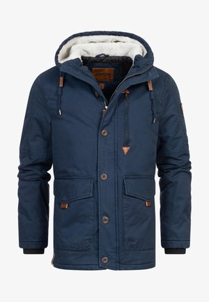 Marineblaues Jacke mit einer fellgefütterten Kapuze, Reißverschluss und Knopfverschlüssen, zwei vorderen Taschen und Lederakzenten an den Reißverschluss- und Taschenrändern.