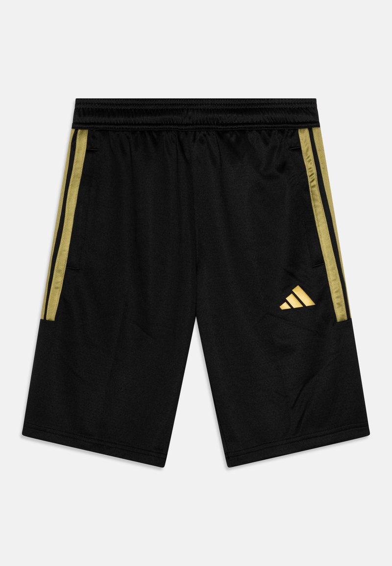 Fekete sportnadrág arany oldalsó csíkokkal, rugalmas derékpánttal és egy kis arany Adidas logóval a bal alsó oldalon.