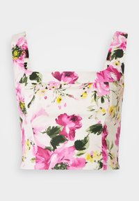 Blommig crop top med breda band, i vitt med livfulla rosaröda och gröna blommönster, tillverkad i lätt tyg.