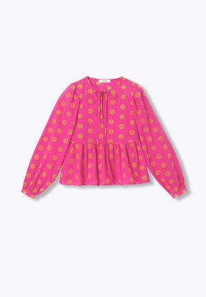 Blouse rose à manches longues avec motif floral jaune, col rond avec lien et ourlet péplum froncé.