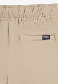 Lacoste STRETCH PANT - Bukse - viennois