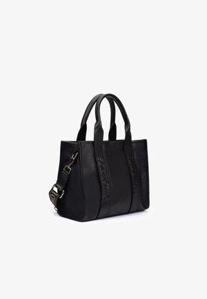 Sac fourre-tout en cuir noir avec deux poignées, bandoulière amovible à motifs, et logo "Pikolinos" embossé sur les panneaux avant.