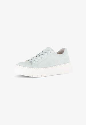 Light gray suede sneaker with white thick sole, round toe, and lace-up closure, angled to show outer side and front.