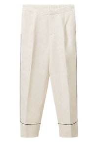 Pantalon fuselé couleur crème avec ceinture élastique et détails de passepoil noirs sur les côtés et près des poignets.