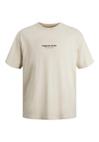 Beige cotton t-shirt with a crew neckline, short sleeves, and a central printed logo "Originals Studio" in black text.