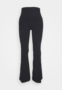 Czarne legginsy dzwonowe z wysokim pasem, wykonane z gładkiego, elastycznego materiału. Posiadają bezszwowy design i minimalne detale szwów.