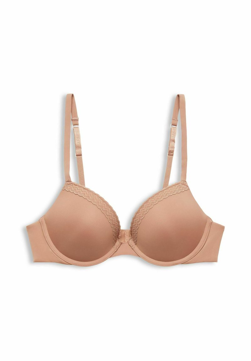 Beige gepolsterter BH mit Unterdraht, verstellbaren Trägern und Spitze entlang der oberen Kanten der Cups vor einem weißen Hintergrund.