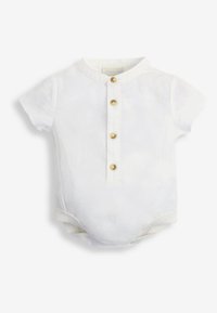 Vit kortärmad bodysuit med mandarin krage, med en knappslå och guldfärgade knappar. Tillverkad i lätt tyg.